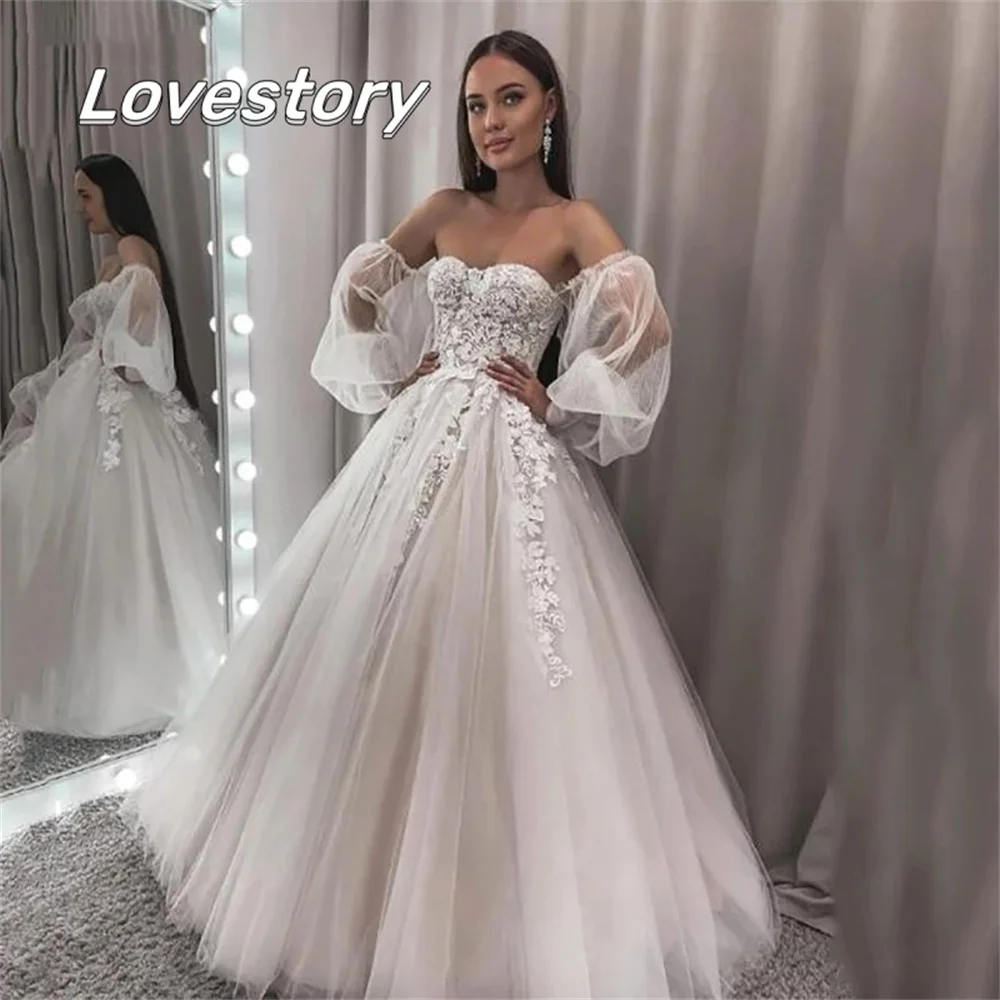 פאף שרוולים תחרה שמלות חתונה קו מחוץ כתף שמלות כלה אפליקציות מחשוף מתוק ללא משענת Vestidos דה Noiva